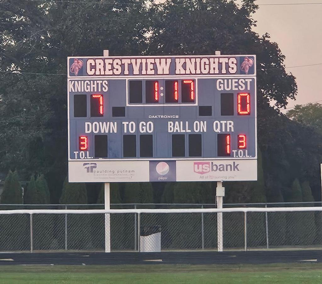 Scoreboard showing Crestview Knights leading 7-0 against the Delphos Jefferson Wildcats with 1:17 left in the first quarter.